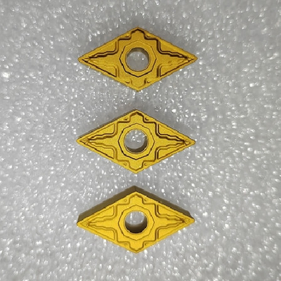Un buon prezzo. Il carburo su ordinazione di CNC inserisce resistente all'uso rivestito di DNMG150604-XD-H in linea